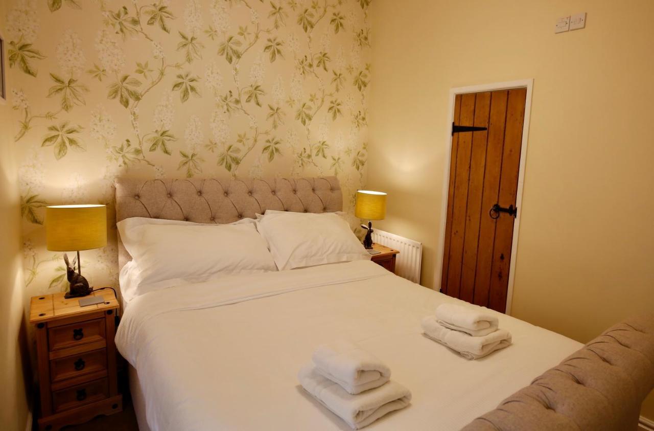 מלון גראסינגטון Ashfield House חדר תמונה A bedroom at the Old Post Office